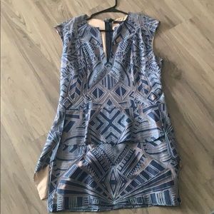 Blue and nude peplum dress.